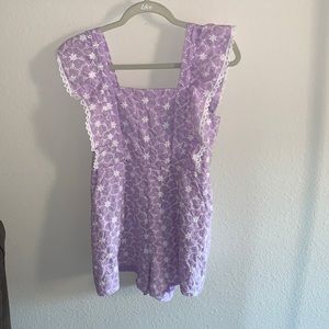 Light purple romper, with white detailing.